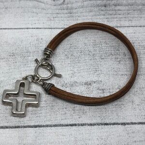 Artisan made leather and sterling silver charm bracelet